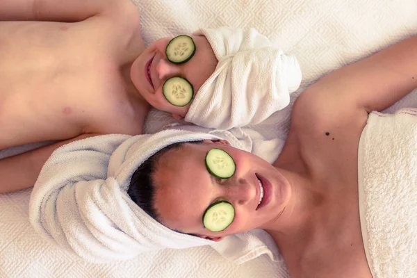 Top View Female Child Resting White Blanket Towel Heads Cucumber — Stock Photo, Image