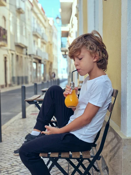 Side View Cute Boy Drinking Fresh Juice Bulb Shaped Bottle — Stock Photo, Image