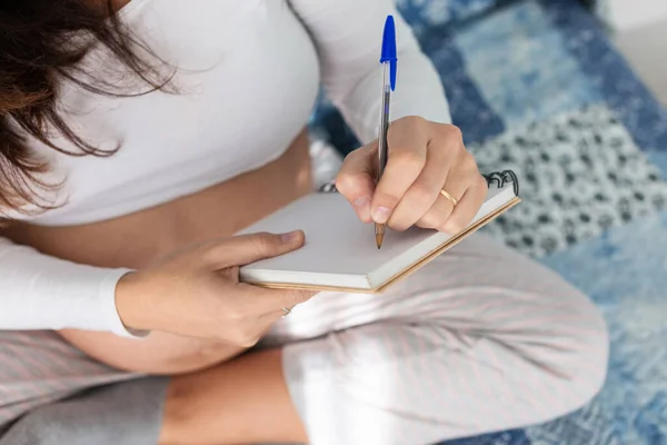 Pregnant Female Sitting Bed Writing Notebook Morning — Stok fotoğraf
