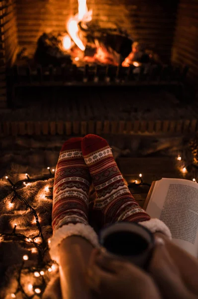 Crop Legs Book Fireplace — Stock Photo, Image