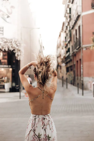 Back View Young Female Tourist Holding Hair While Walking Empty — Stock Photo, Image