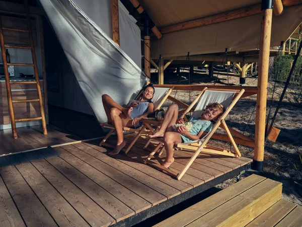 Full Body Content Mother Son Resting Deckchairs Wooden Terrace Building — Stock Photo, Image