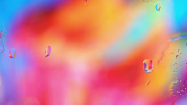 Closeup Tempo Real Através Janela Água Colorida Espalhando Sobre Superfície — Vídeo de Stock