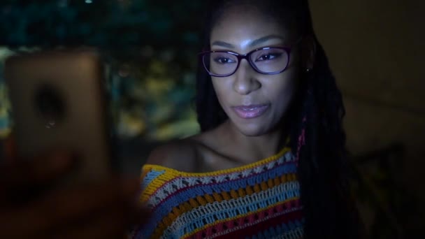 African American Female Braids Speaking Video Chat Smartphone While Sitting — 비디오