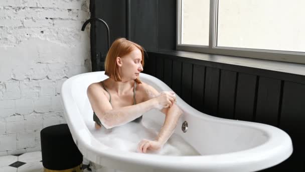 Happy Young Redhead Female Bra Smiling While Resting Bathtub Washing — Stock Video