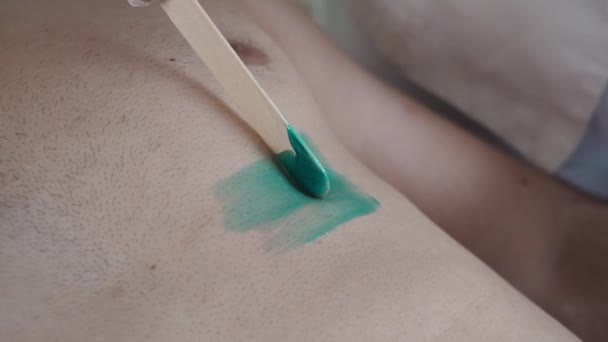 Closeup Crop Beautician Gloves Waxing Naked Torso Male Customer Lying — Stok video