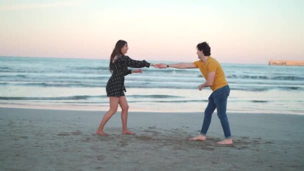 Young Couple Dancing Enjoying Sunset Beach — Stock Video
