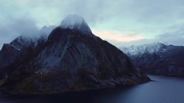 Drone View Rippling Sea Surrounded Massive Rocky Mountains Sharp Snowy — Stock Video