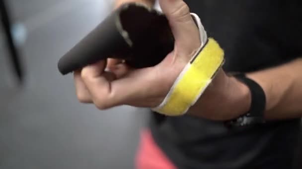 Unrecognizable Man Wrapping Elastic Band Wrist While Preparing Training Gym — Stock Video