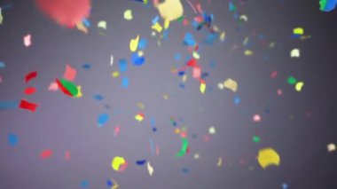 konfeti gri arkaplanda düşüyor