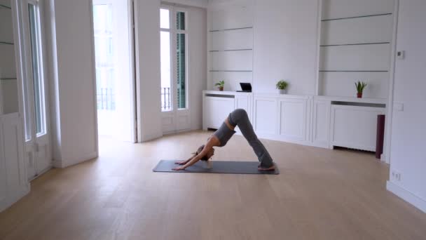 Side View Slim Female Doing Yoga Mat Spacious Room Home — Stock Video