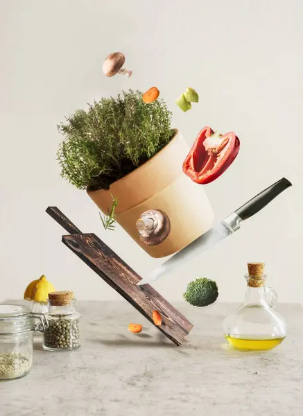 Creative Food Levitation Concept Flying Cutting Board Knife Vegetables Potted — Stock Photo, Image