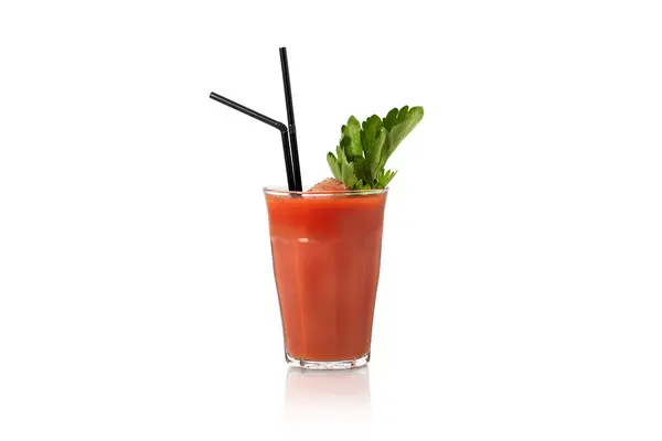 stock image A classic Bloody Mary cocktail with a celery stick, garnished with parsley and a strawberry, presented in a highball glass against a pure white backdrop, symbolizing freshness and elegance