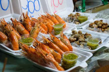 Artisan and tipical food from Thailand exposed at local market and bazar clipart