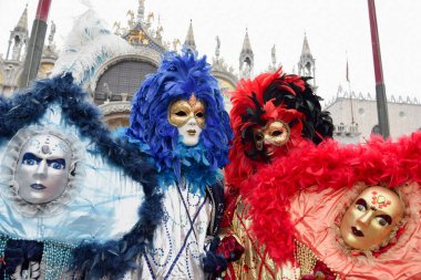 Couple of people dressed up for the Venice Carnival.