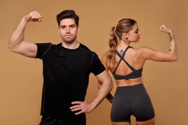 Formda bir erkek ve kadın dayanıklılık ve atletizm örneği göstererek başkalarına kendilerini adama ve enerjiyle sağlık ve spor hedeflerini takip etmeleri için ilham verir, enerjik ve sağlıklı bir yaşam tarzını teşvik eder.