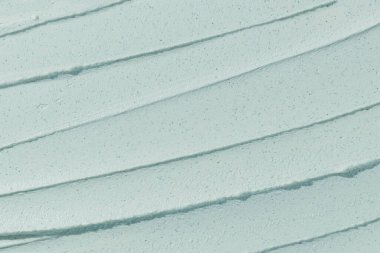 Güzellik kremi dokusu. Mavi kozmetik maske arka planı. Kremalı cilt ürünleri yakın çekim