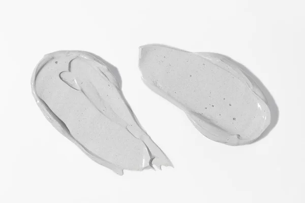 Grijs Schoonheidsmasker Smeren Vlek Witte Achtergrond Cosmetische Huidverzorging Product Textuur — Stockfoto