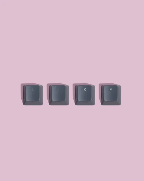 Like - text on keyboard keycap. Pink background.