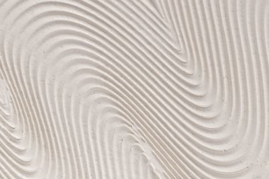 Bej nemlendirici kremin yakın çekim dokusu. Cilt bakım ürünü geçmişi. Yüz maskesi