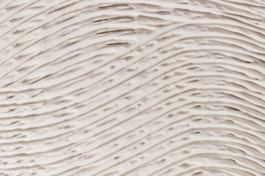 Bej nemlendirici kremin yakın çekim dokusu. Cilt bakım ürünü geçmişi. Yüz maskesi