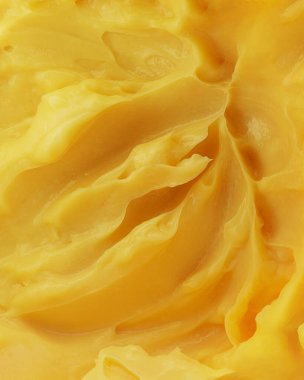 Beauty cream texture. Yellow lotion, moisturizer, skin care cosmetic product smear background