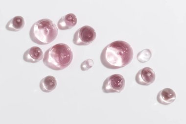 Kozmetik jel ya da güzellik jölesi serumu dokusu. Pembe şeffaf cilt bakım kolajeni ürünü 