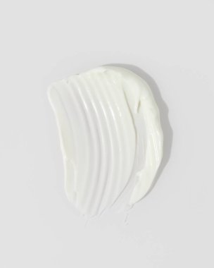 Yeşil güzellik kremi lekesi. Kozmetik cilt ürünü dokusu. Kaydırma kumaşı. 