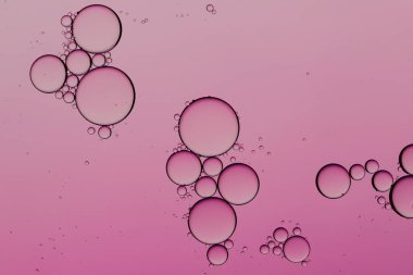 Pembe arkaplanda kopyalama alanı olan su baloncuklarını kapat