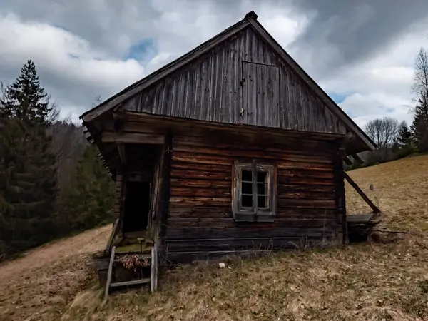 wooden house on a hill