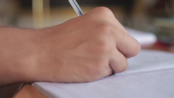 Shot Human Hand Writing Piece Paper Black Colored Pen Footage — Stockvideo