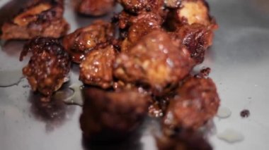 Close-up shot of chicken pieces frying in hot oil, Hd footage. Fried Chicken. Frying Chicken in oil.