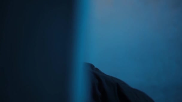 Close Cinematic Style Shot Man Dark Colored Jacket Hiding Something — Stock Video