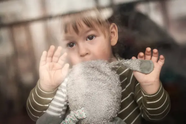 Portrait Cute Baby Boy Stuffed Toy Looking Out Window Looking — Stock Photo, Image