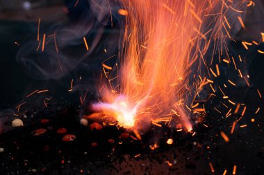 fire in dark. explosion black powder.