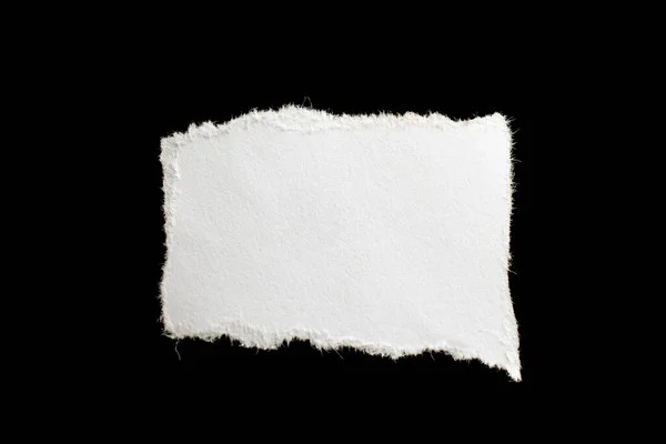 Pezzo Carta Bianco Uno Sfondo Nero Isolato — Foto Stock