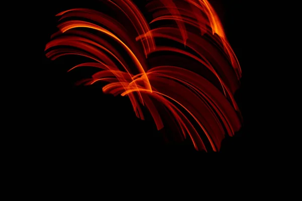 burning in motion. lines of fire in the dark