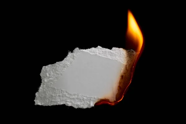 Yanan kağıt, parlayan kağıt kenarı siyah arkaplan üzerinde