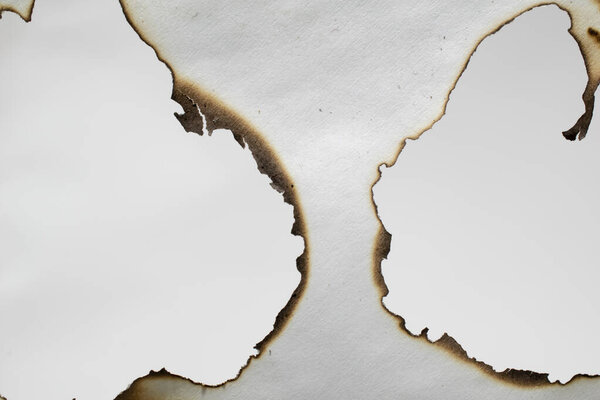burning paper, glowing edge of paper on a white  background