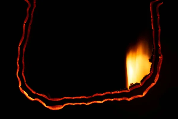 Burning Paper Glowing Edge Paper Black Background — Fotografia de Stock