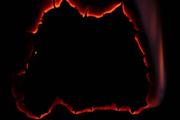 Burning Paper Glowing Edge Paper Black Background —  Fotos de Stock