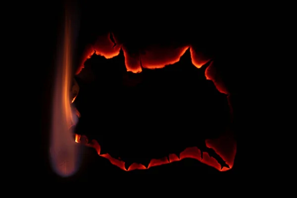 Burning Paper Glowing Edge Paper Black Background — Stockfoto