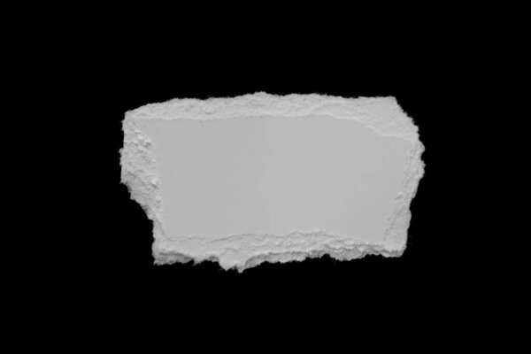 edge of a torn white sheet of paper on a black background, black hole