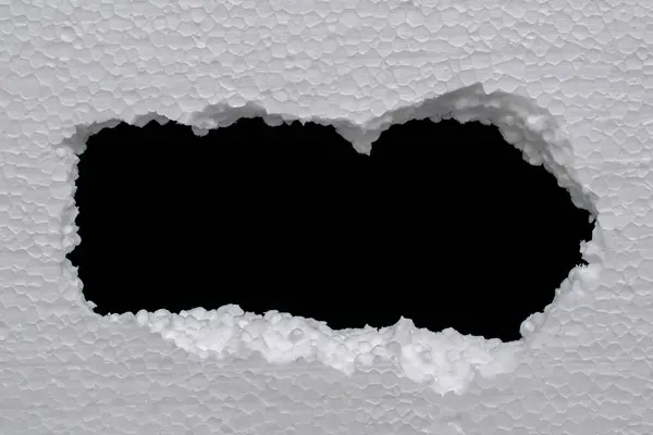 Styrofoam frame, black hole in the board