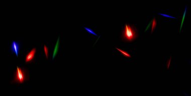 Karanlıktaki renkli ışıkların parıltıları