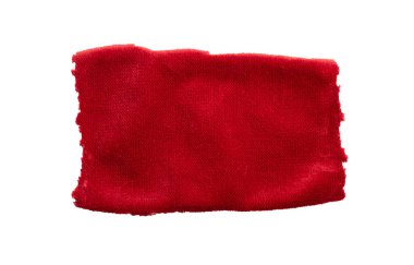 Yıpranmış ve yırtık bir kırmızı paçavra parçası.