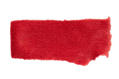 Yıpranmış ve yırtık bir kırmızı paçavra parçası.