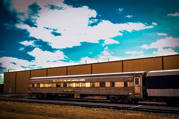 old freight train on blue background. travel, transportation and transport concept.