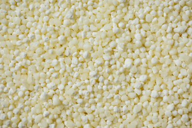 Pişmemiş sago tanecikli arka plan, doku, üst manzara.
