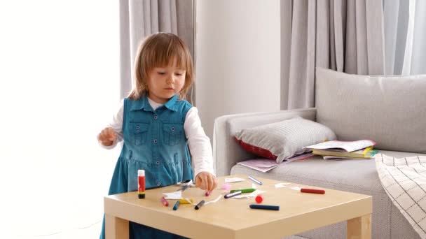 Children Development Girl Makes Craft Paper Glue Colour Pencils — Stockvideo